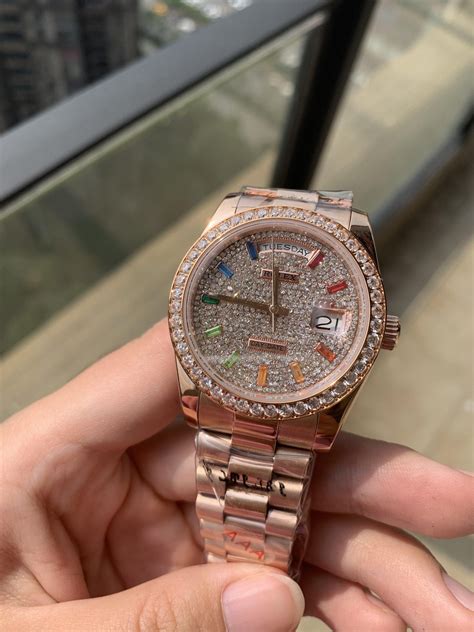 rolex day date iced out.